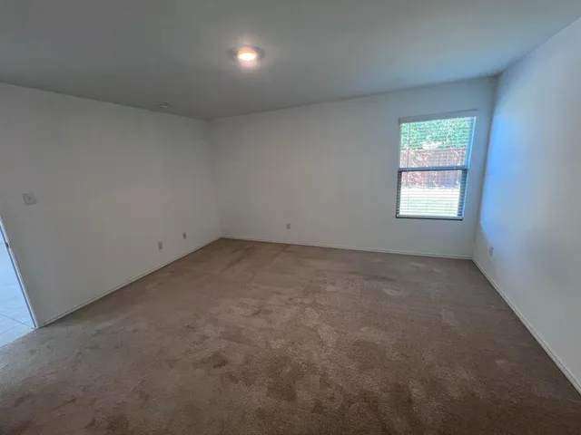 a view of small space with racks on the wall