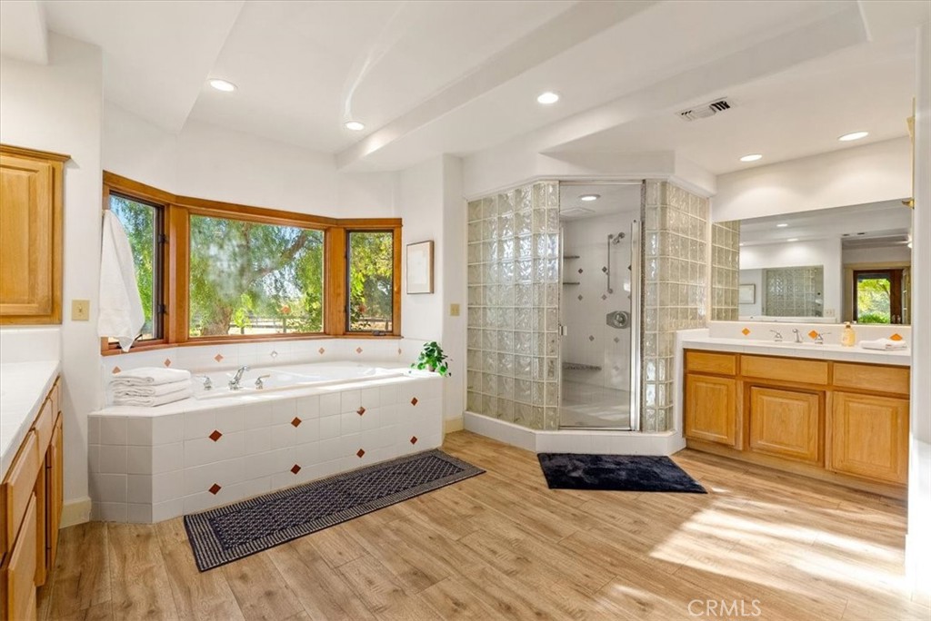 5745 Iron Gate Road Paso Robles, CA 93446 - Photo 25 of 58 Primary Bathroom with separate shower and soaking tub.
