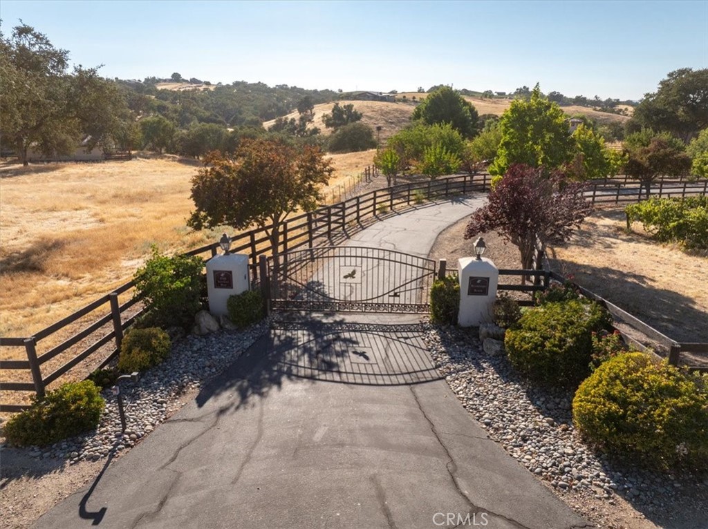 5745 Iron Gate Road Paso Robles, CA 93446 - Photo 3 of 58 Gated entry with tree lined driveway.