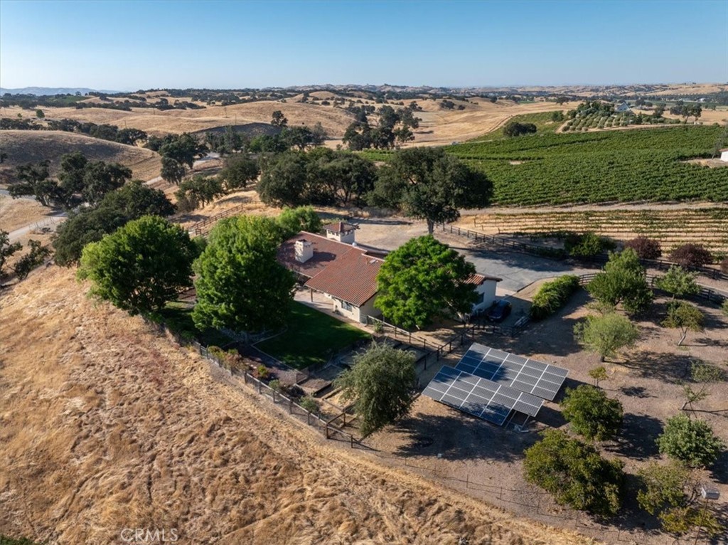 5745 Iron Gate Road Paso Robles, CA 93446 - Photo 38 of 58 Home, vineyard, solar panels, and orchard.