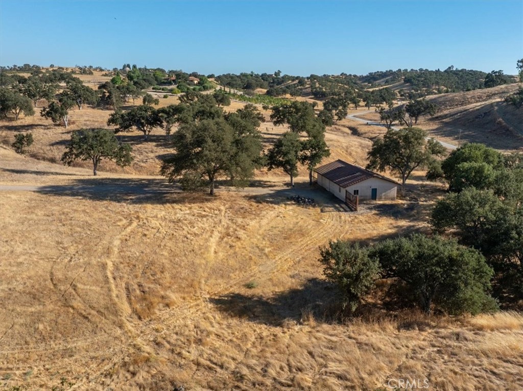 5745 Iron Gate Road Paso Robles, CA 93446 - Photo 54 of 58 Aerial view of the shop, pastures and oak trees.