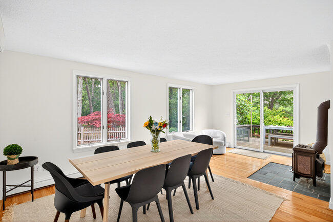 20 Mutiny Way Mashpee, MA 02649 - Photo 18 of 36 a view of a dining room with furniture and a potted plant