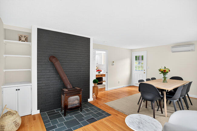 20 Mutiny Way Mashpee, MA 02649 - Photo 20 of 36 a living room with furniture and a wooden floor