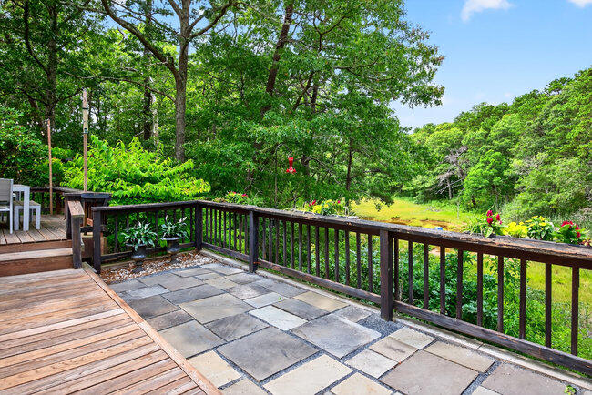 20 Mutiny Way Mashpee, MA 02649 - Photo 25 of 36 a view of a balcony with wooden floor