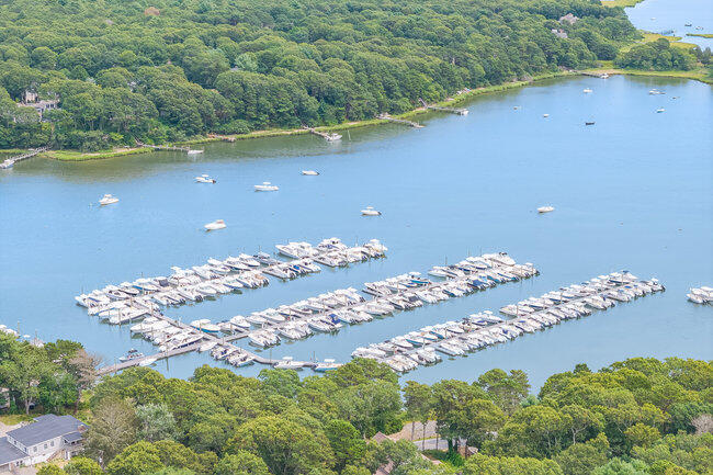 20 Mutiny Way Mashpee, MA 02649 - Photo 32 of 36 a view of a lake with an outdoor space