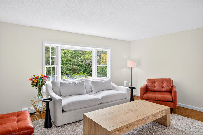 20 Mutiny Way Mashpee, MA 02649 - Photo 8 of 36 a living room with furniture and a large window