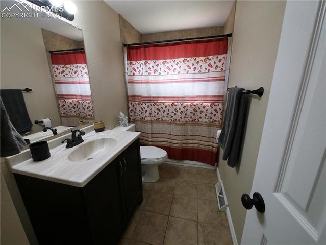 402 Yellowstone Road Colorado Springs, CO 80910 - Photo 17 of 28 Upper Bathroom