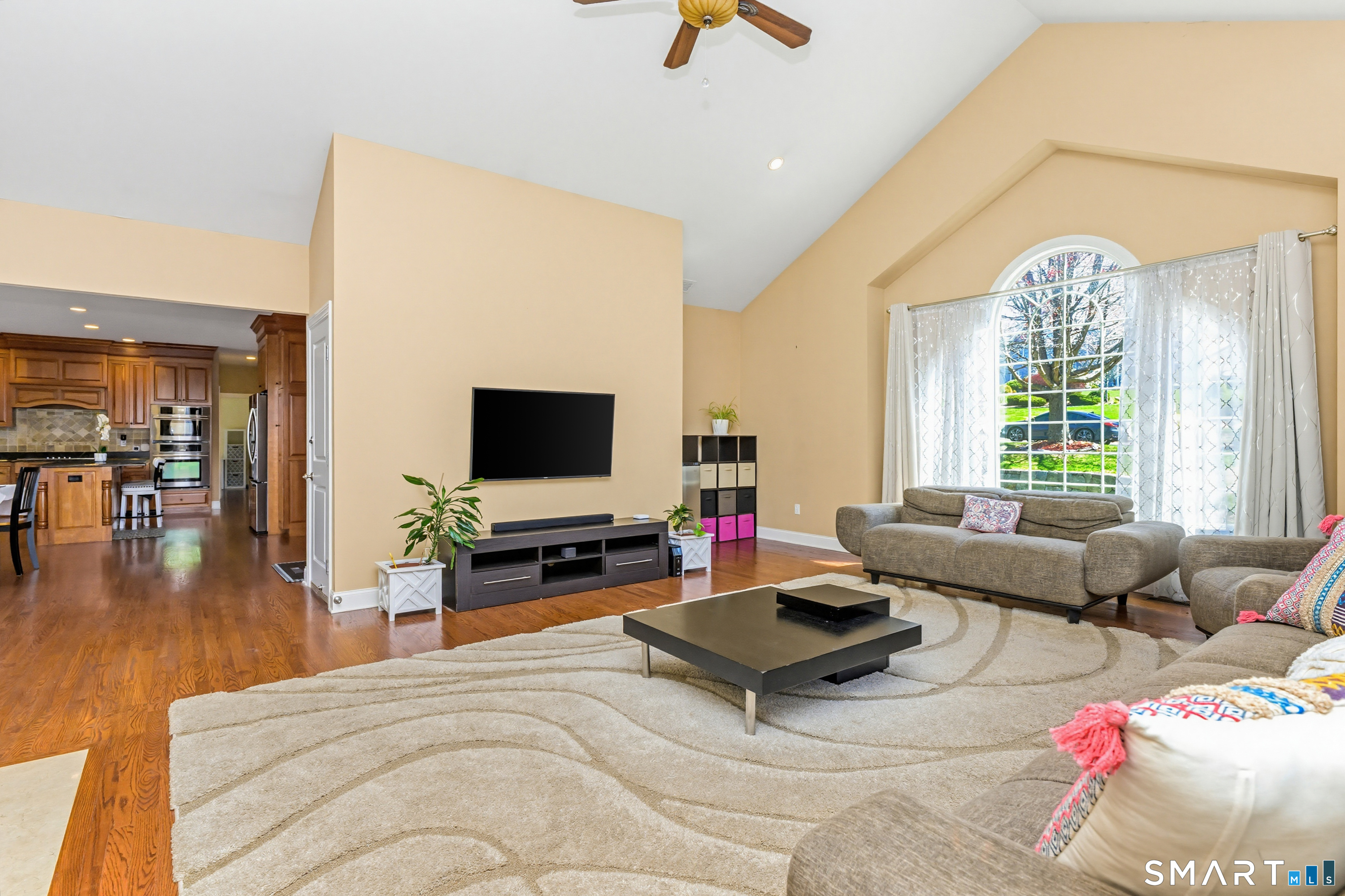 30 Block Farm Road Monroe, CT 06468 - Photo 9 of 40 a living room with furniture and a flat screen tv