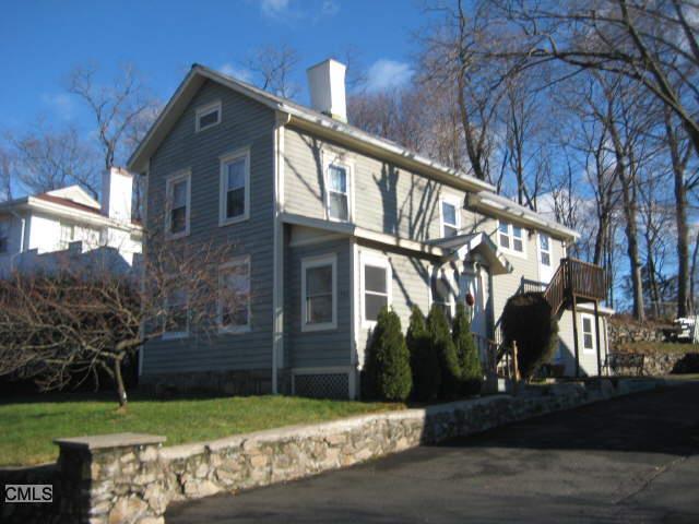 236 Flax Hill Road Norwalk, CT 06854 - Photo 1 of 1 a view of a house with a yard