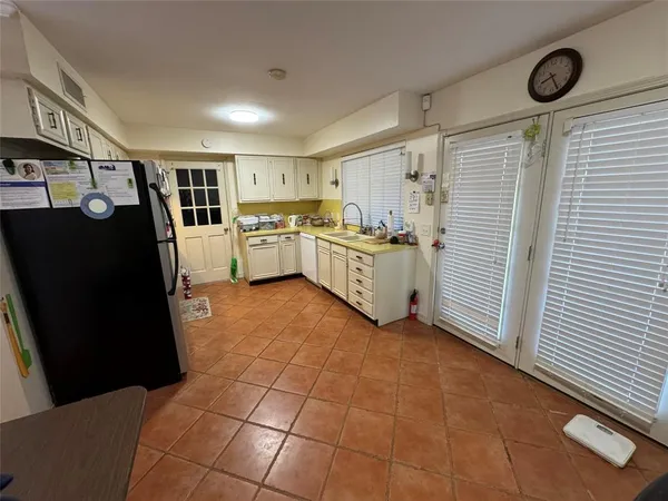 a yard with lots of green space