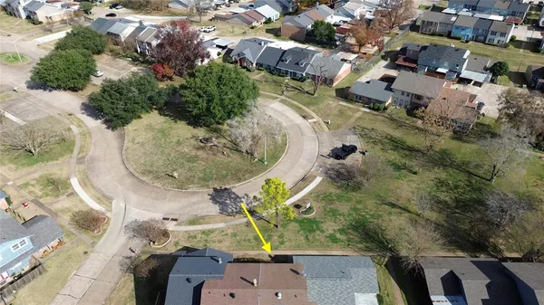 an aerial view of a highlighted house