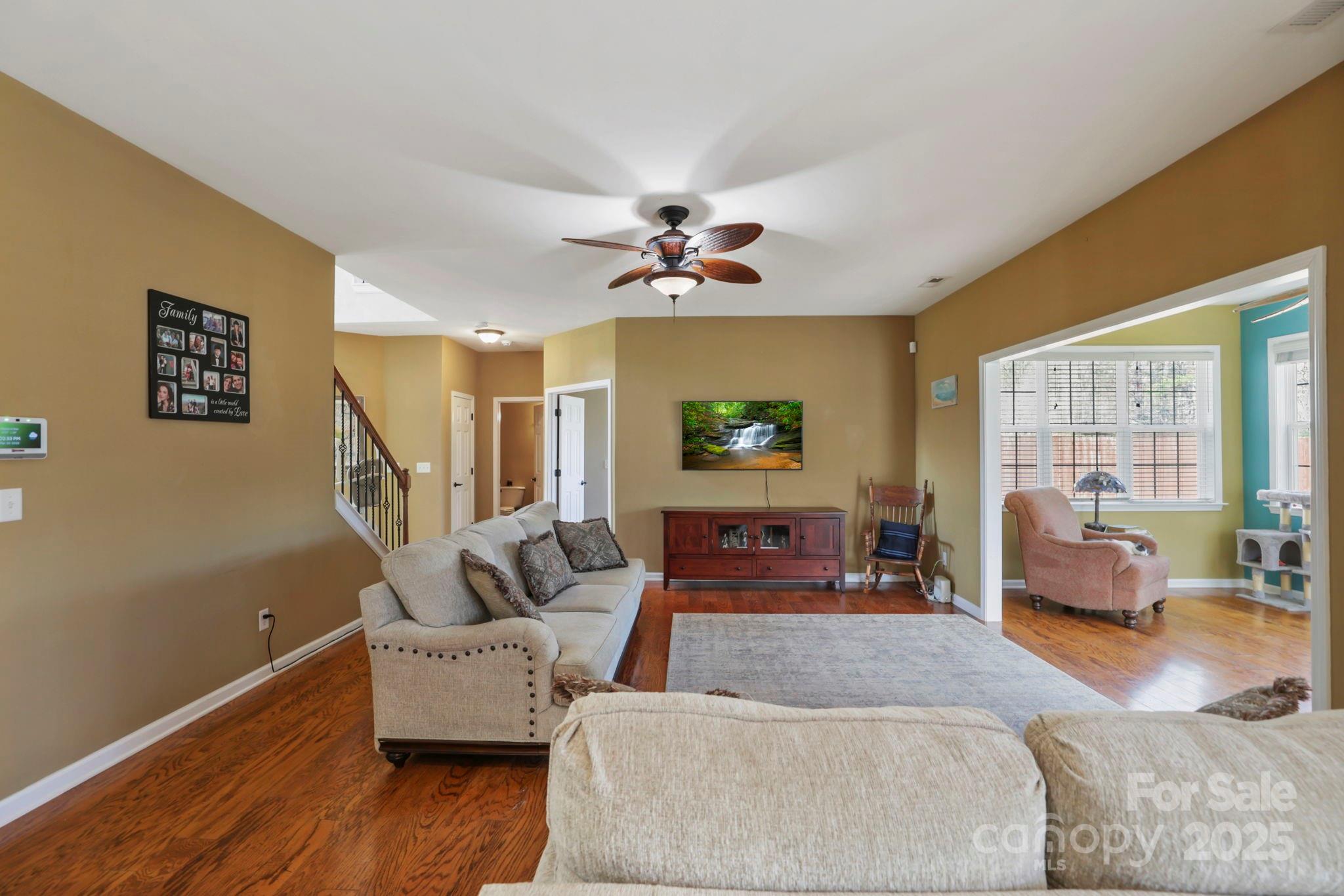 243 Wildbriar Road Fletcher, NC 28732 - Photo 6 of 36 a living room with furniture and a large window