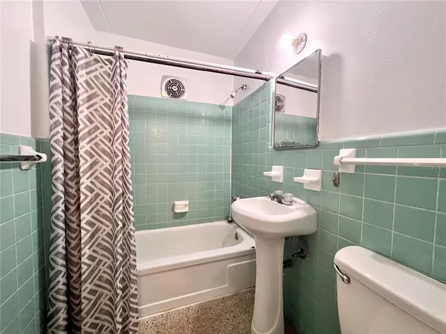 a view of a bench in a backyard