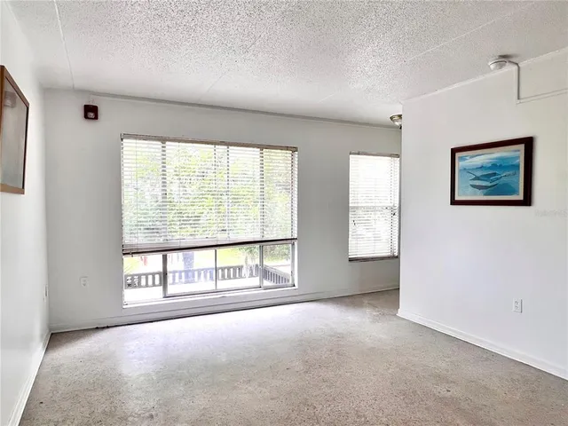 an empty room with windows