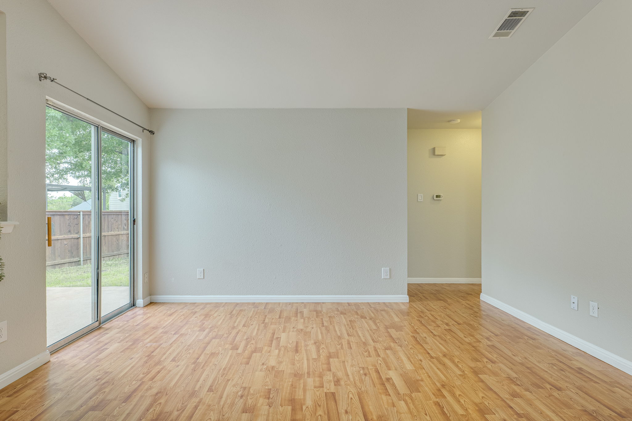 4815 Transit Circle Austin, TX 78727 - Photo 10 of 35 Another view of the living room, showcasing the spacious layout and inviting atmosphere.