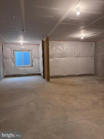 a view of livingroom with furniture and windows