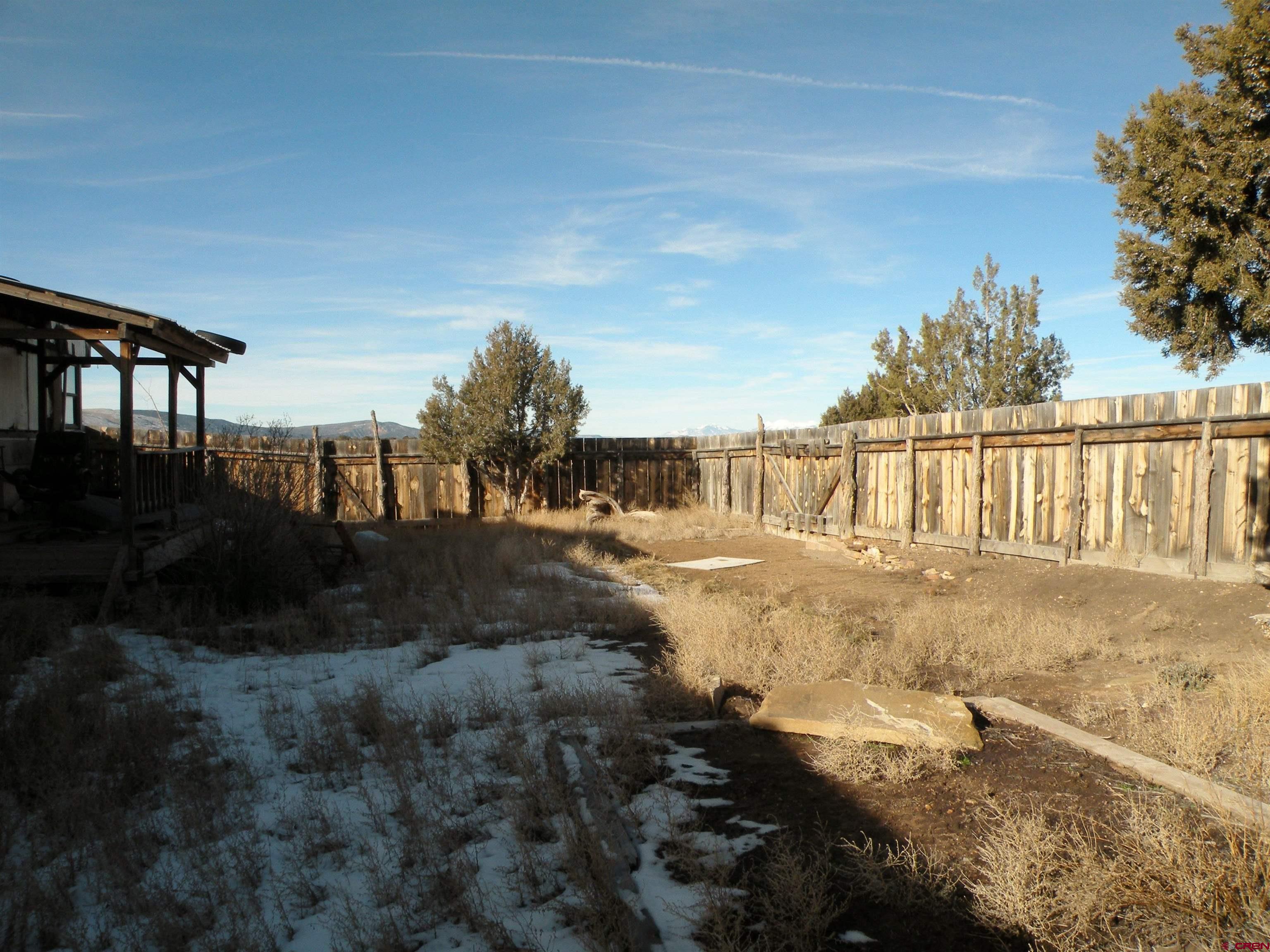 a view of swimming pool with seating space