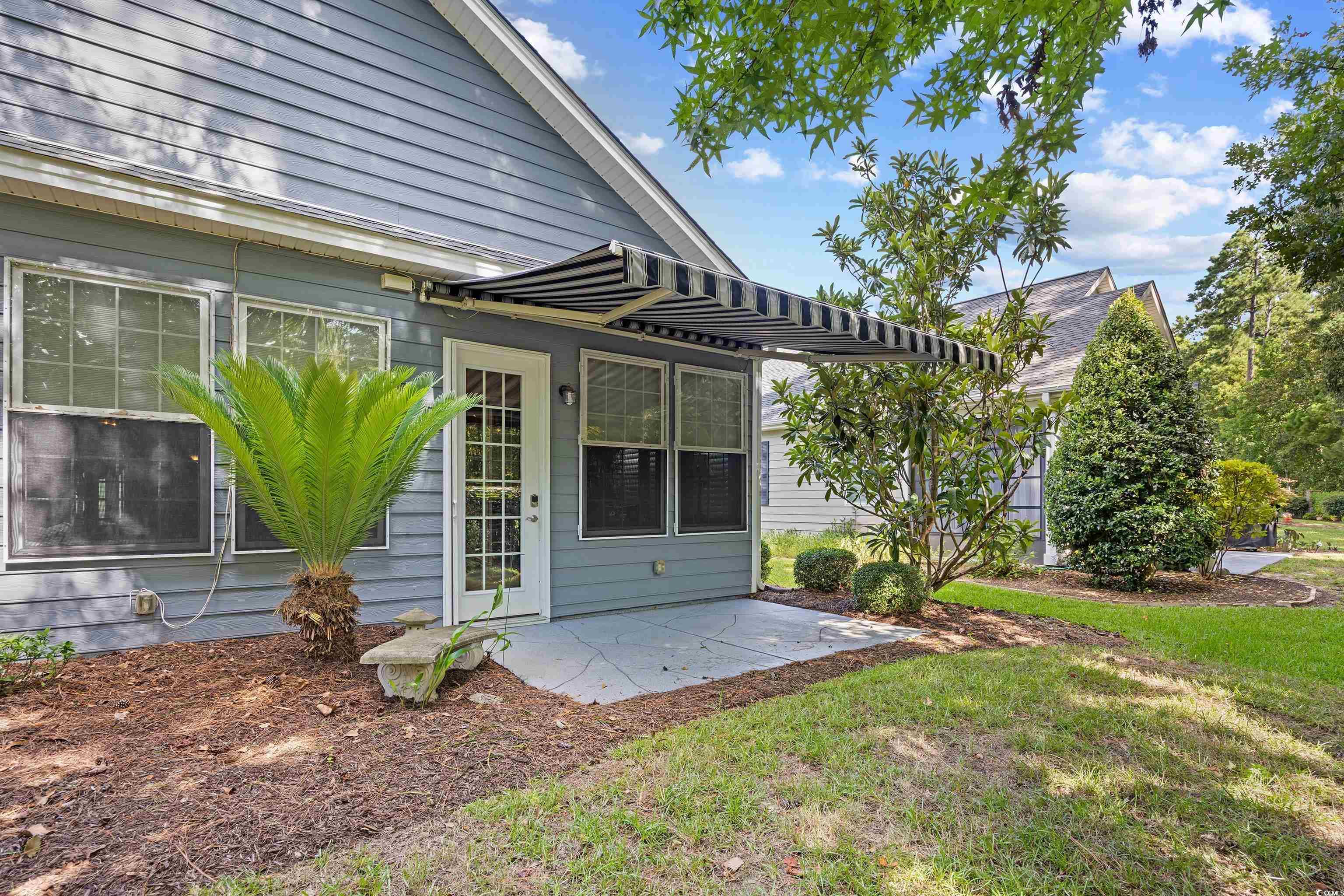 1158 Kiawah Loop Murrells Inlet, SC 29576 - Photo 28 of 40 Features a retractable remote controlled awning