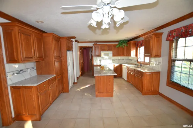 $395,000 | 3 Chestnut Drive, Blue Grass, IA 52726