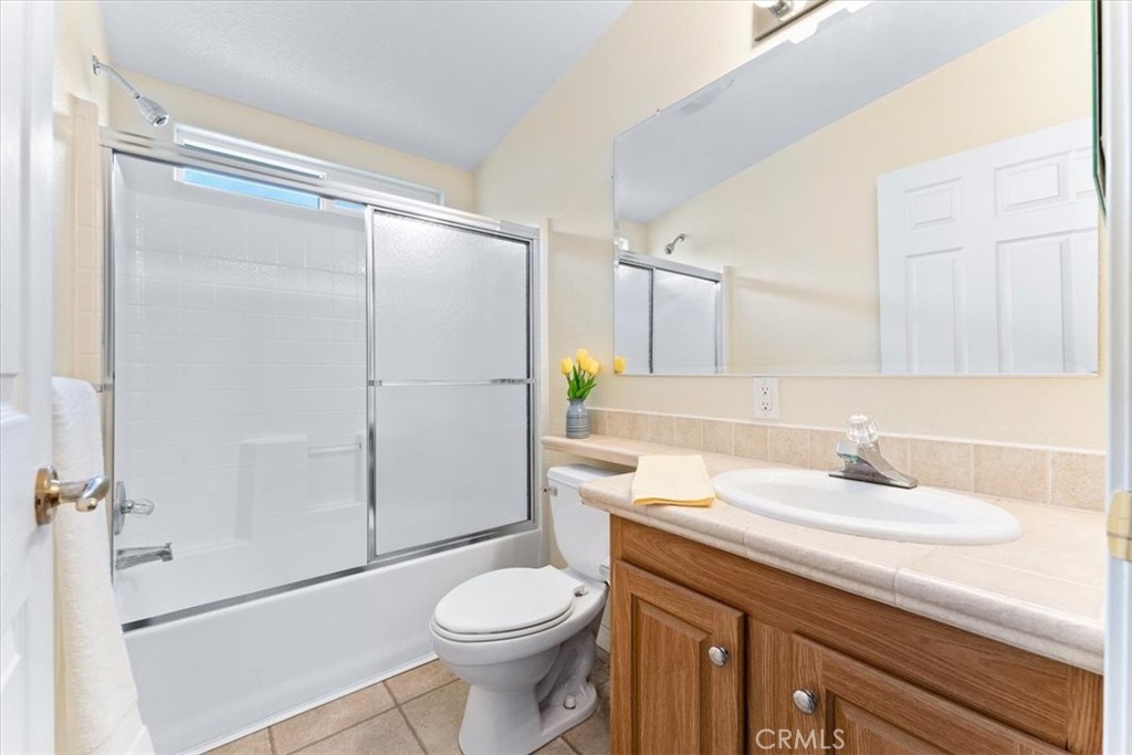 32 Pine Via Anaheim, CA 92801 - Photo 17 of 19 a bathroom with a sink a toilet and shower