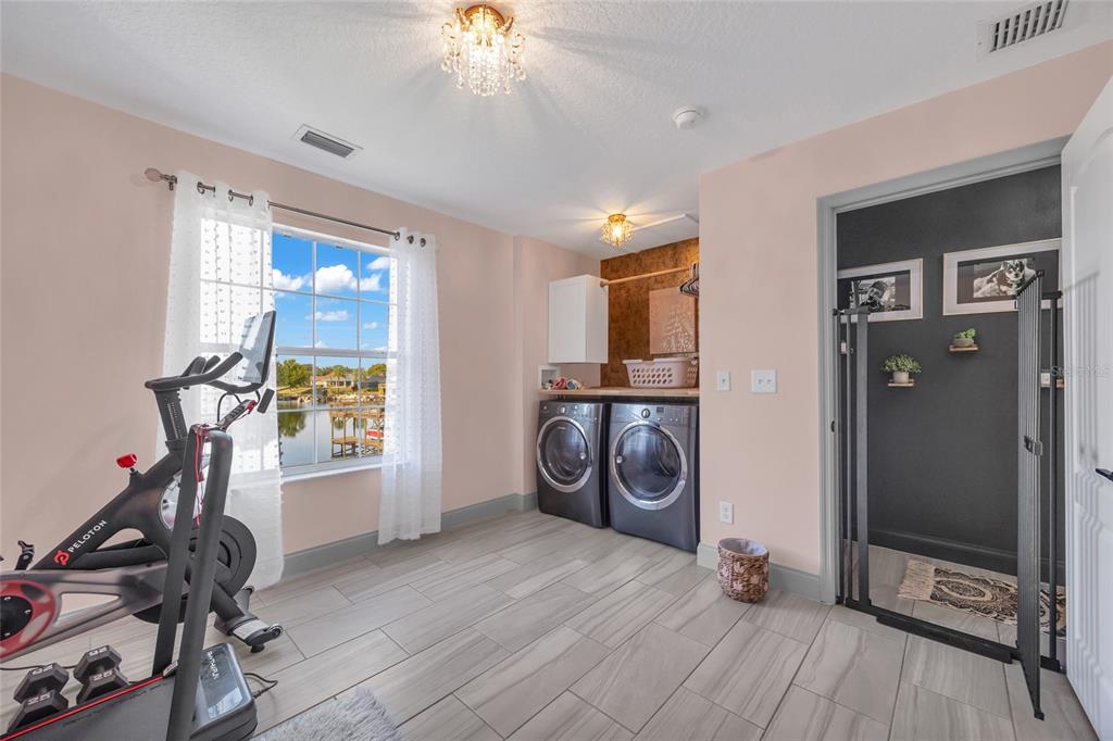 11243 Preston Cove Road Clermont, FL 34711 - Photo 22 of 72 a view of a room with gym equipment