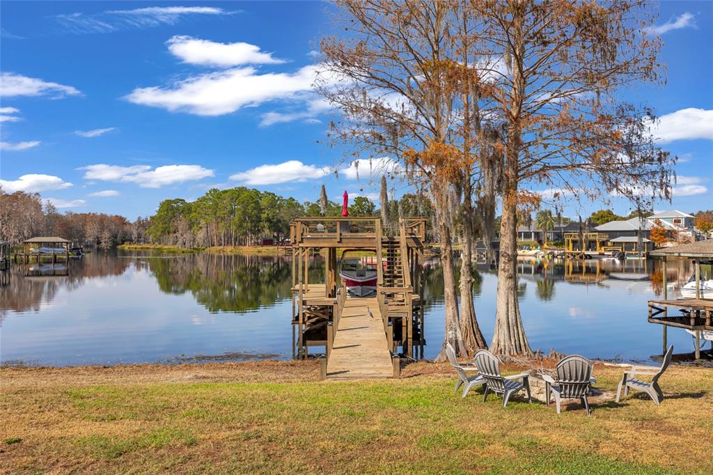11243 Preston Cove Road Clermont, FL 34711 - Photo 3 of 72 a view of a lake with boats and trees