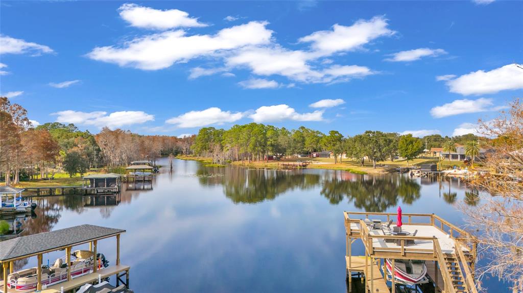 11243 Preston Cove Road Clermont, FL 34711 - Photo 52 of 72 a view of a lake with outdoor space