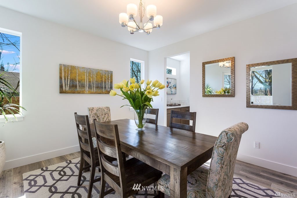 4900 Northeast 1st Street Renton, WA 98059 - Photo 4 of 14 a dining room with furniture and window