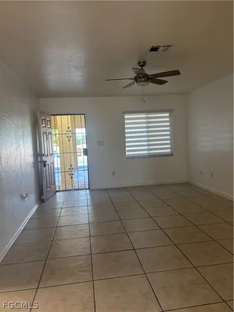 a view of a hallway with a chandelier