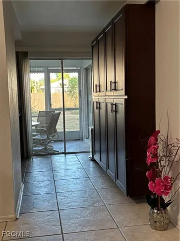 a view of a refrigerator in kitchen and dining room
