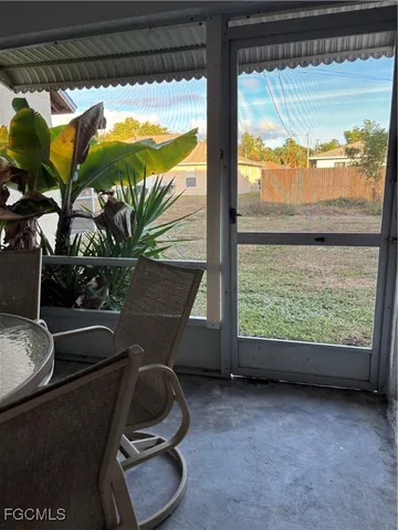 a room with furniture and a window