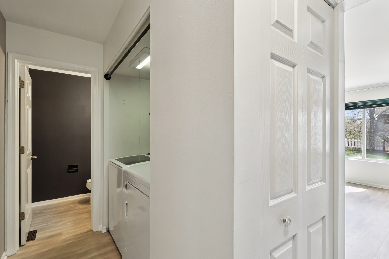 257 Indian Ridge Lane Lake Villa, IL 60046 - Photo 23 of 38 a view of a hallway with closet and wooden floor