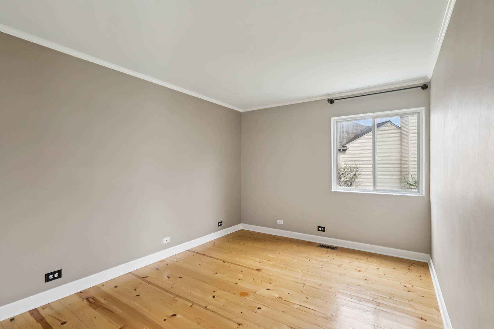 257 Indian Ridge Lane Lake Villa, IL 60046 - Photo 27 of 38 an empty room with a window