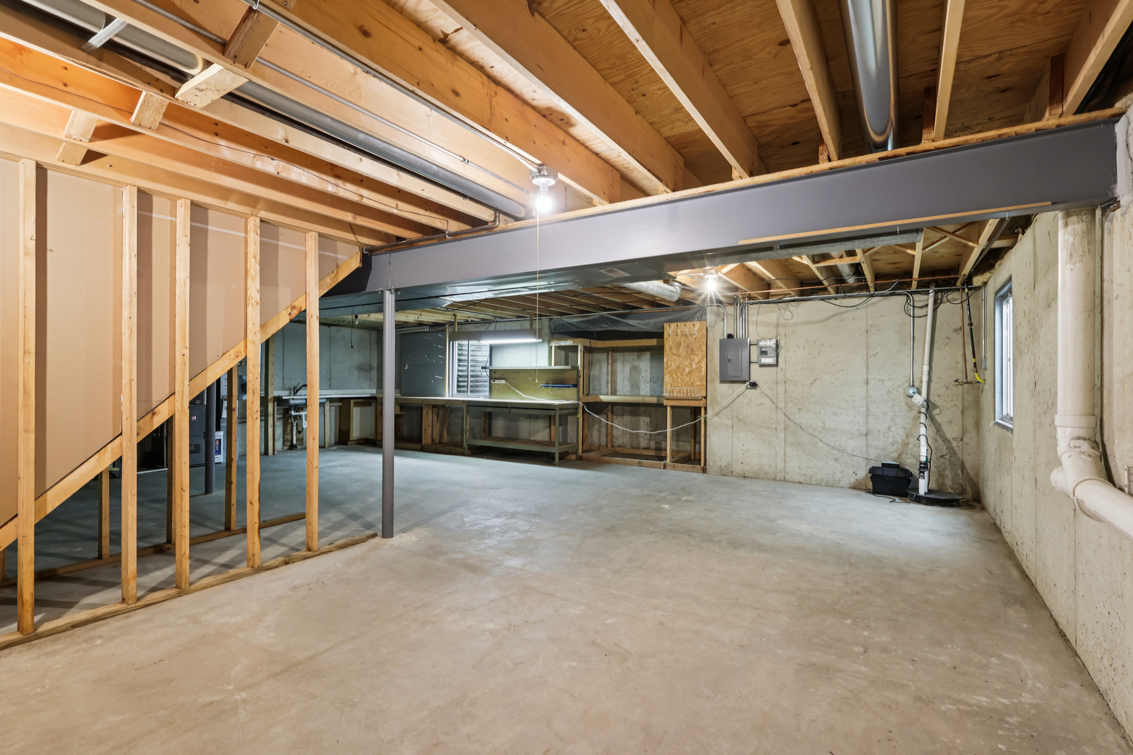 257 Indian Ridge Lane Lake Villa, IL 60046 - Photo 29 of 38 a view of an empty room with wooden roof and stairs