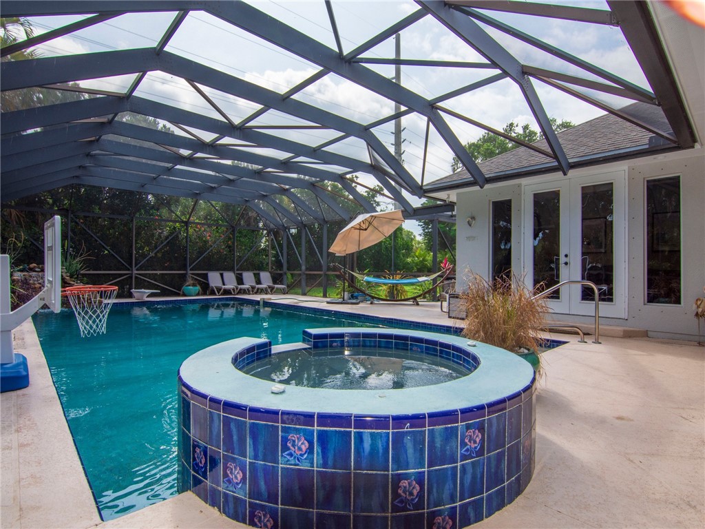 a view of fountain with a swimming pool