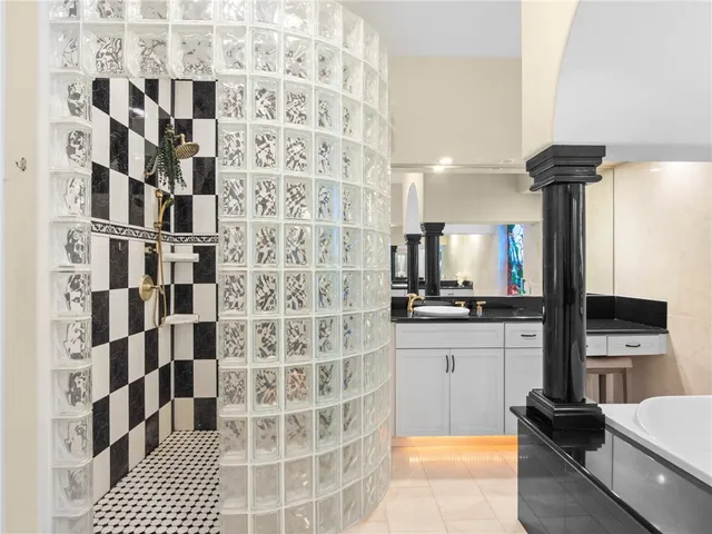 a kitchen with a sink and a refrigerator