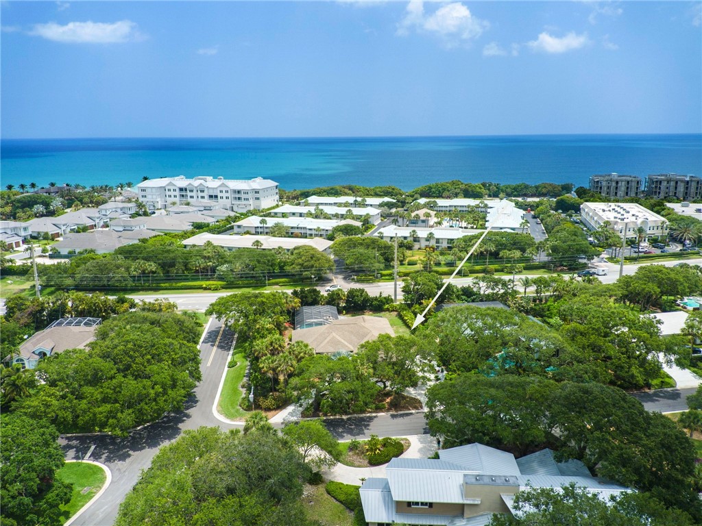 4676 Pebble Bay South, Unit BAY Vero Beach, FL 32963 - Photo 3 of 36 a view of a city with ocean view