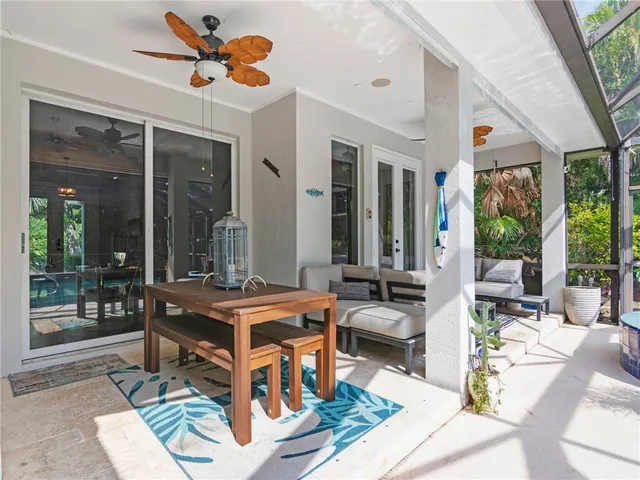 a outdoor space with patio the couches and a dining table with the view of the balcony