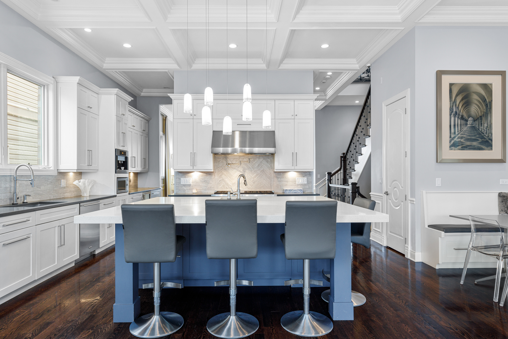 Undisclosed Address Chicago, IL 60657 - Photo 11 of 52 a kitchen with a dining table chairs and wooden floor