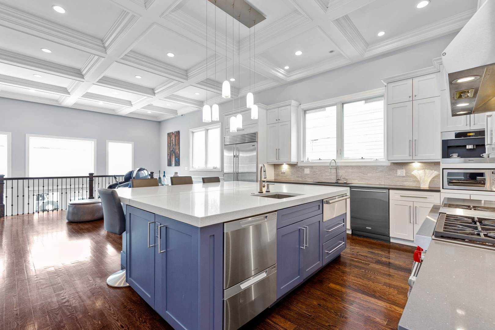 Undisclosed Address Chicago, IL 60657 - Photo 12 of 52 a kitchen with stainless steel appliances granite countertop a sink a stove and a wooden floors