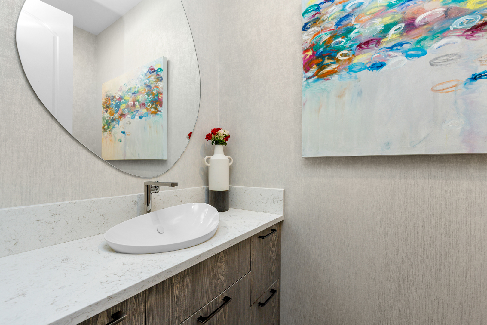 Undisclosed Address Chicago, IL 60657 - Photo 16 of 52 a bathroom with a sink and mirror with painted walls