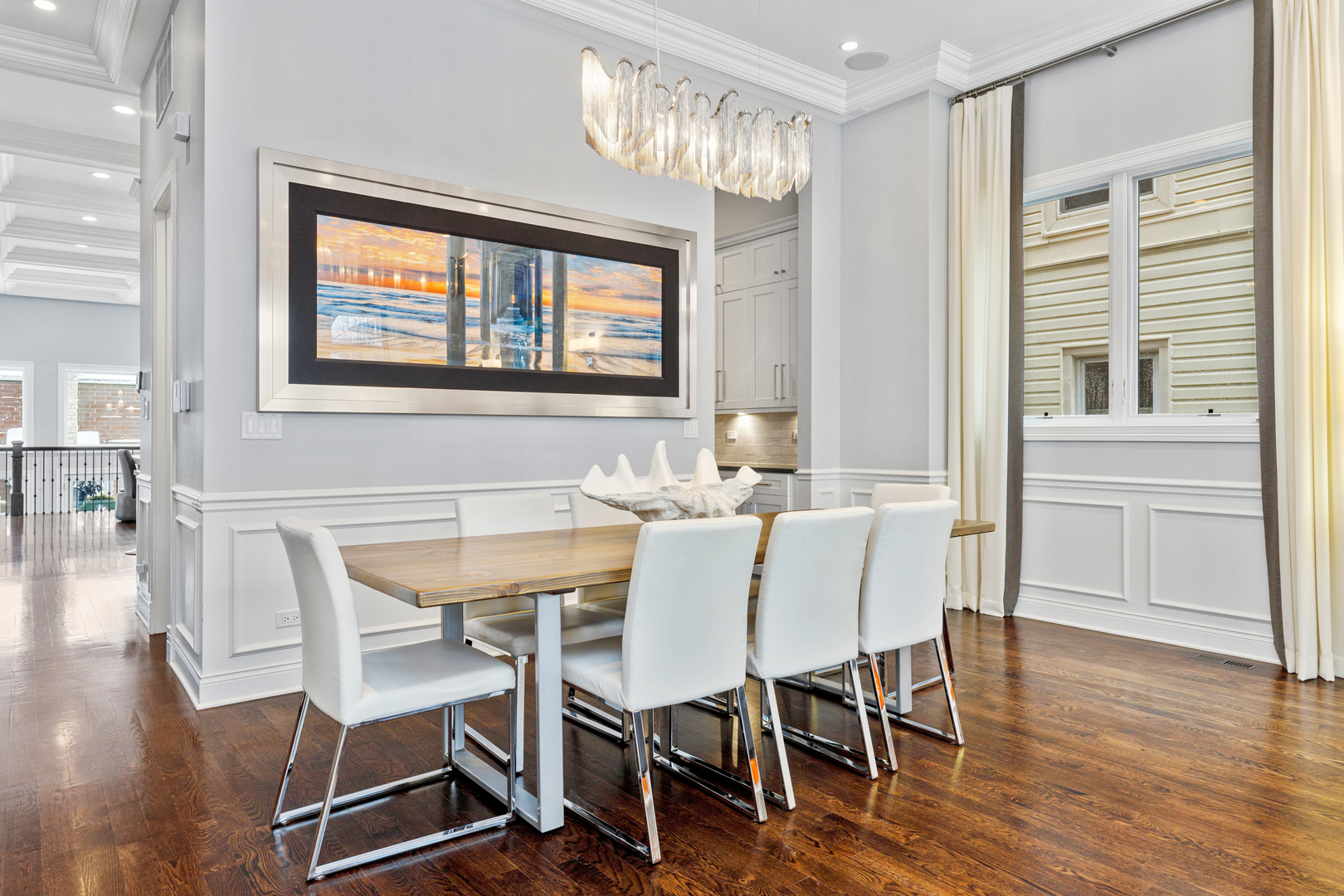Undisclosed Address Chicago, IL 60657 - Photo 24 of 52 a dining room with furniture a chandelier and wooden floor