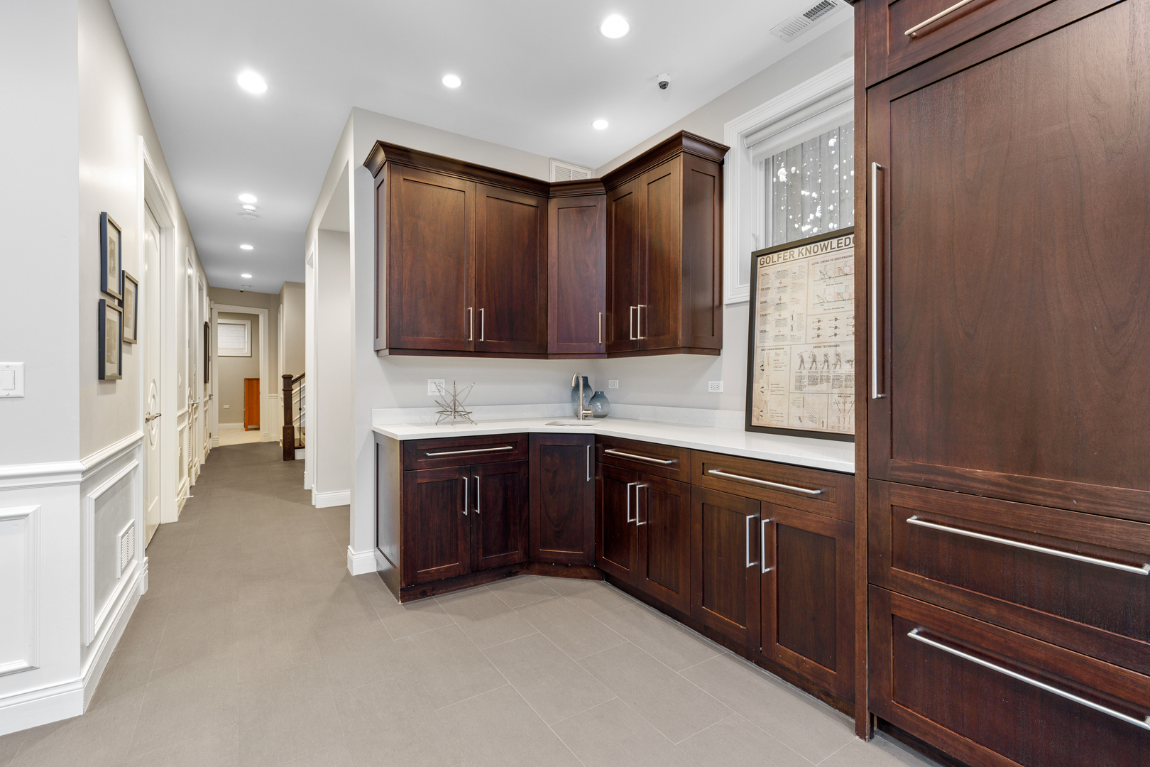 Undisclosed Address Chicago, IL 60657 - Photo 25 of 52 a large kitchen with stainless steel appliances granite countertop a refrigerator and a stove top oven