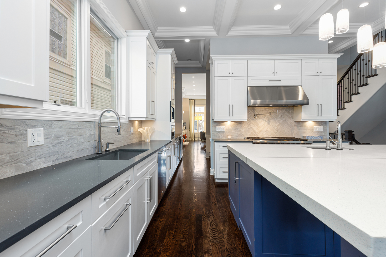Undisclosed Address Chicago, IL 60657 - Photo 33 of 52 a kitchen with stainless steel appliances granite countertop a sink stove and cabinets