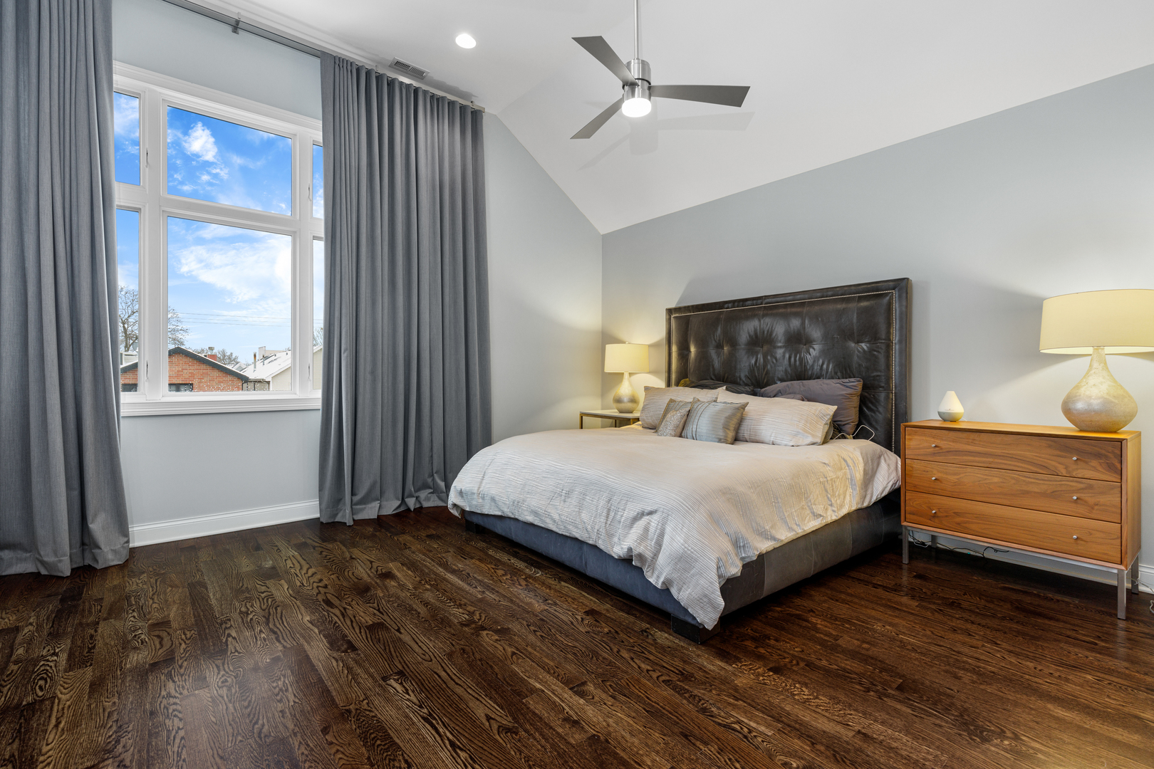 Undisclosed Address Chicago, IL 60657 - Photo 40 of 52 a bedroom with a bed and a window