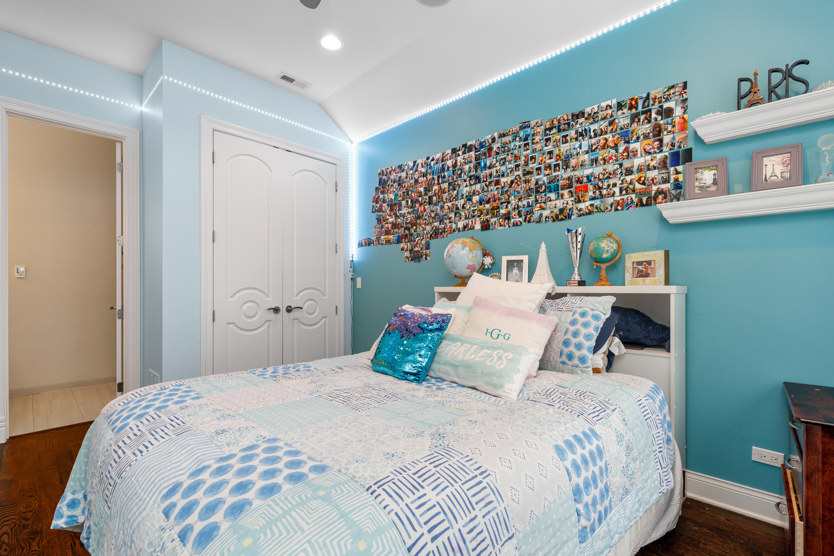 Undisclosed Address Chicago, IL 60657 - Photo 45 of 52 a bedroom with a bed and a painting on the wall