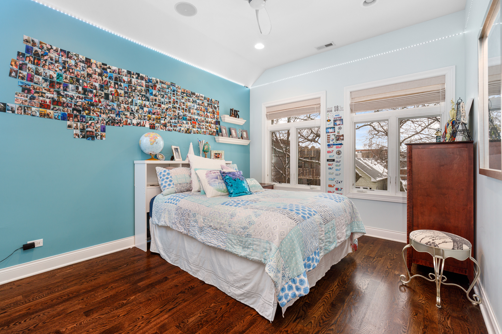 Undisclosed Address Chicago, IL 60657 - Photo 46 of 52 a bedroom with a bed and wooden floor