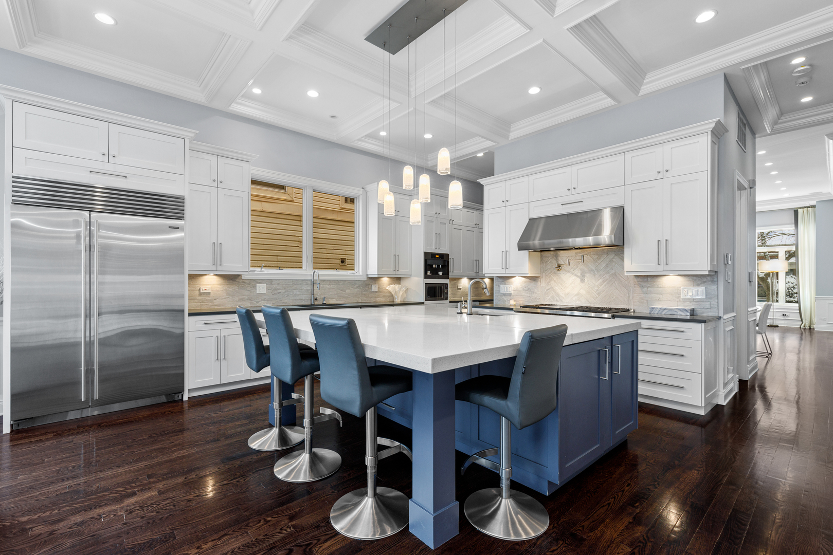 Undisclosed Address Chicago, IL 60657 - Photo 9 of 52 a kitchen with stainless steel appliances granite countertop a sink stove and wooden floor