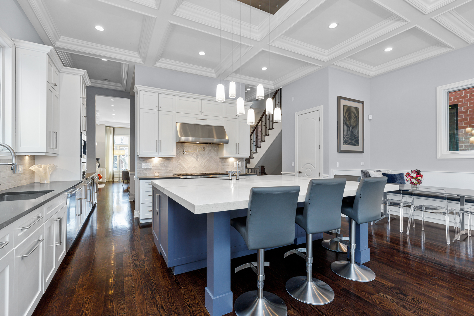 Undisclosed Address Chicago, IL 60657 - Photo 10 of 52 a large kitchen with a table and chairs in it