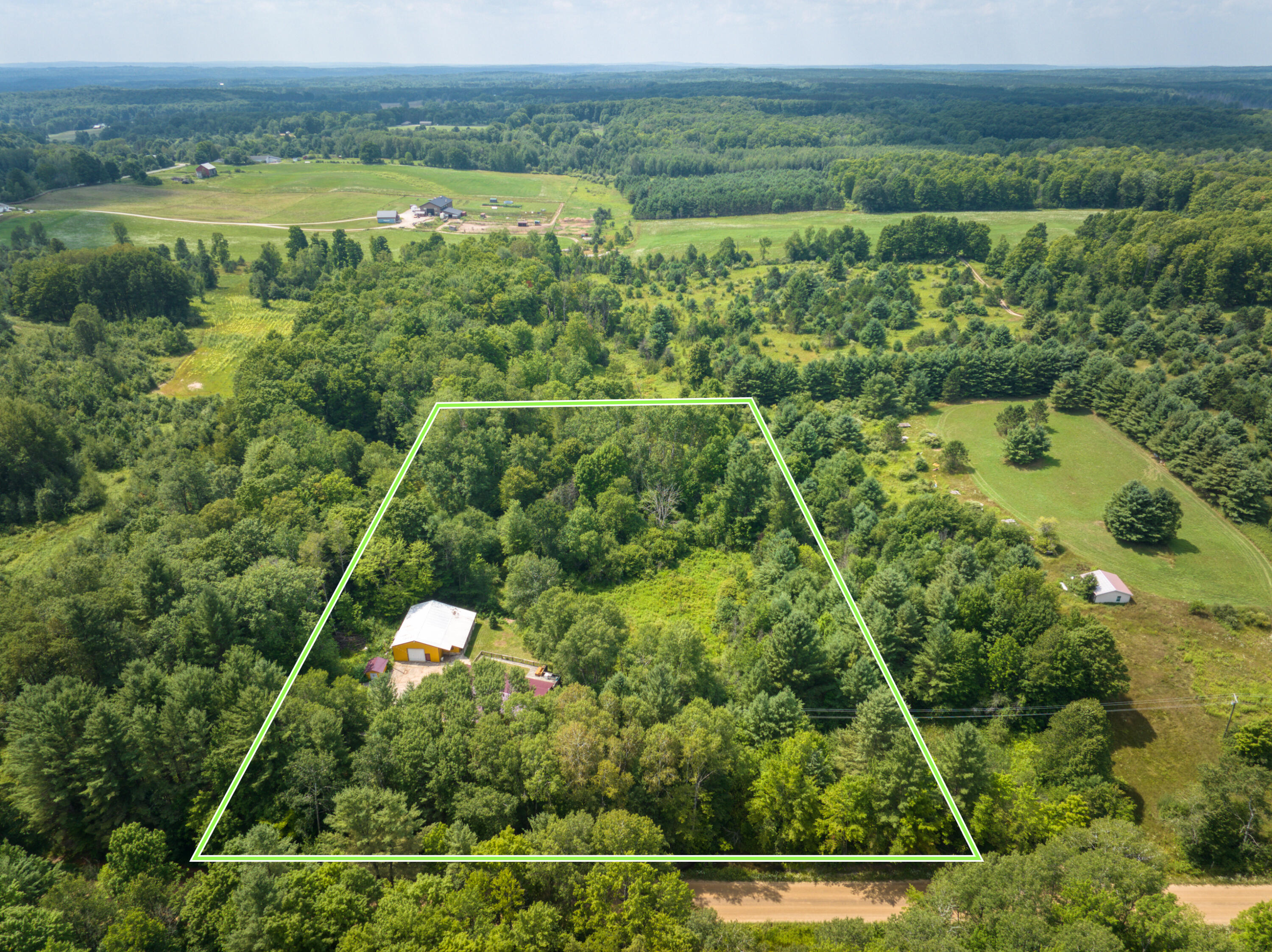 8271 Lakola Road Tustin, MI 49688 - Photo 47 of 52 DJI_20250721041828_0262_D_53